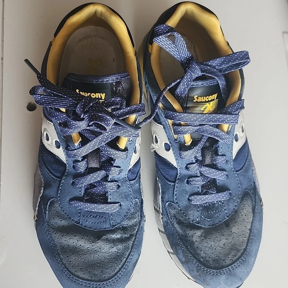 Saucony Blue and Yellow Sneakers Small stains of ink on both tennis in front